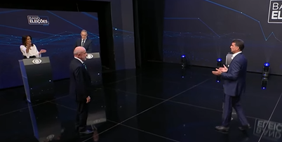 Fl&aacute;vio Bolsonaro (PL) e Lula (PT) se enfrentam no debate da Band neste domingo, 18 Foto: Reprodu&ccedil;&atilde;o/Band TV